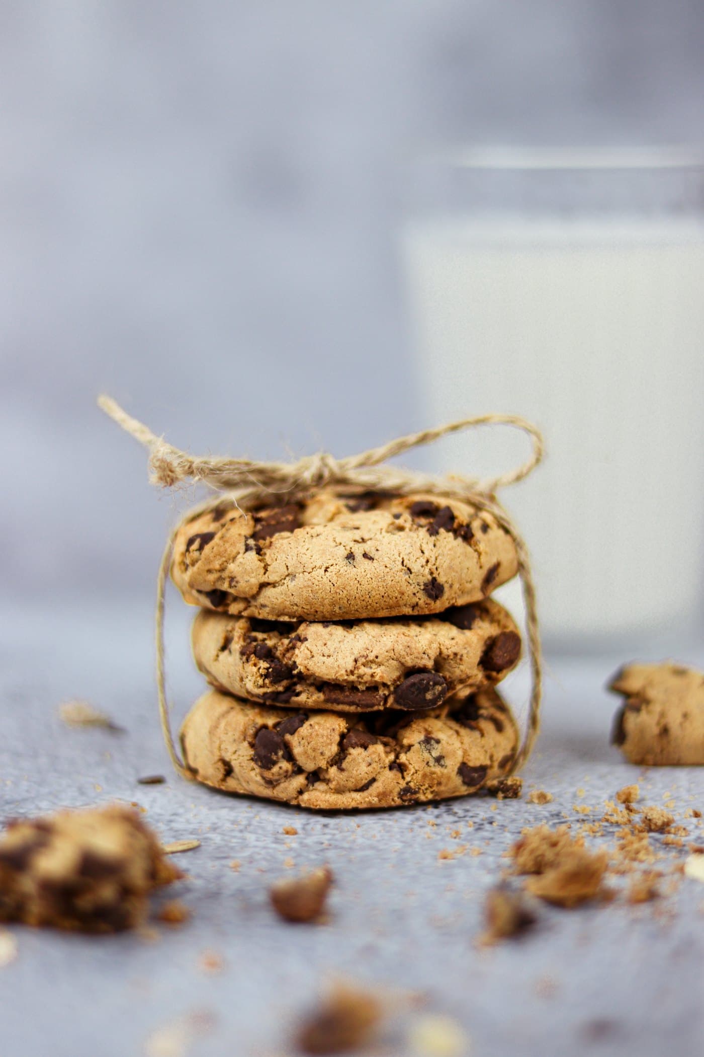 Chocolate chip cookies tied in a stack with twine